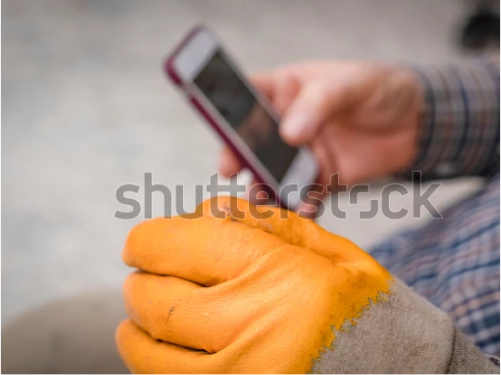 worker-wearing-yellow-gloves-looking-600w-1697917210 1